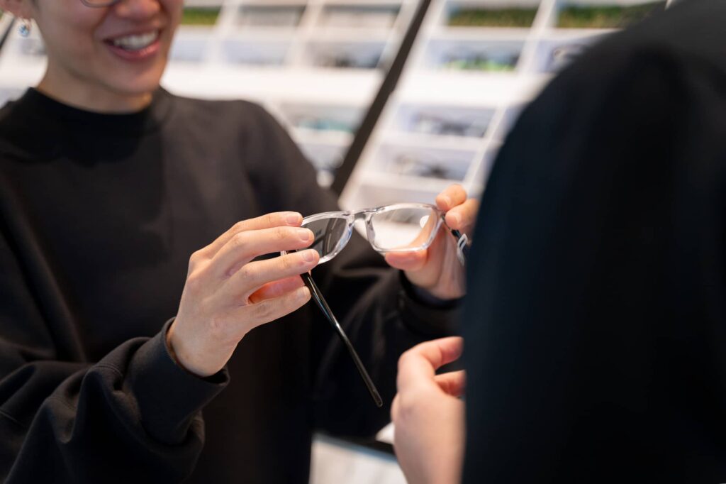 glasses frame with multi focal lenses being repaired