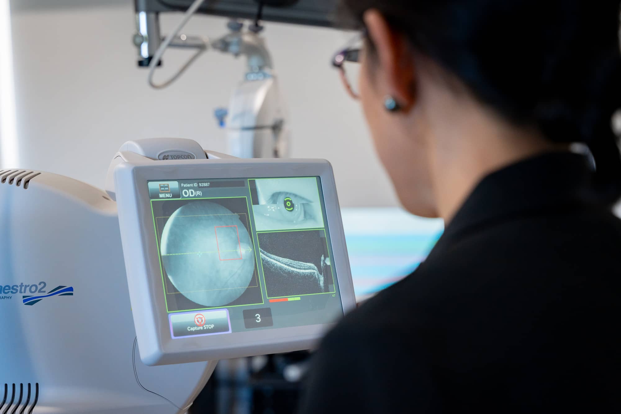 expert optometrist completing an eye exam